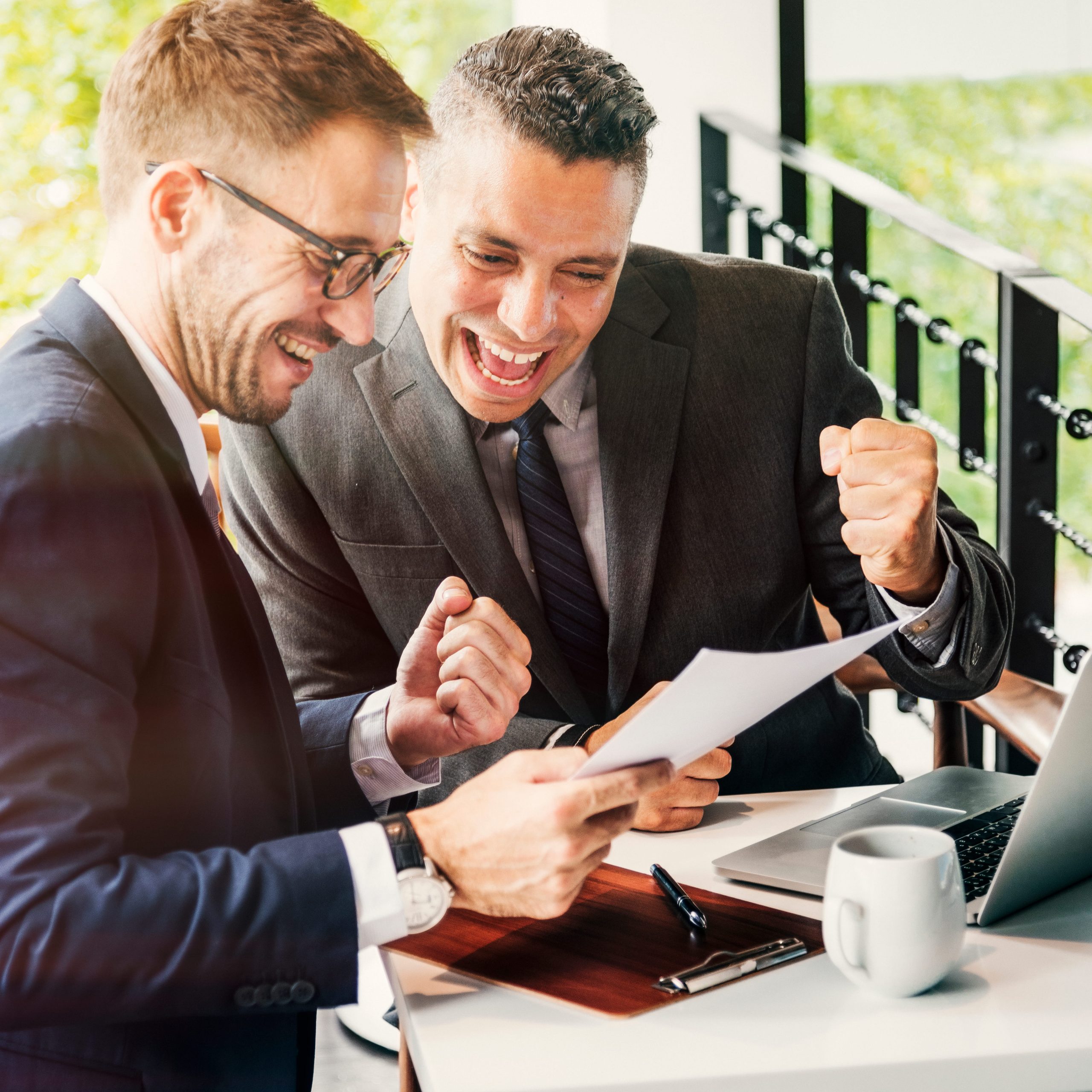 businessmen-success-gesture-cheerful-concept (1) King capital hero image